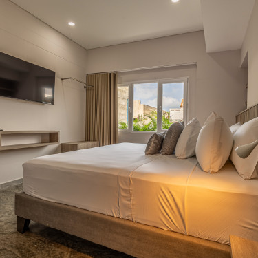 Habitaciones Apartamentos de la Cruz